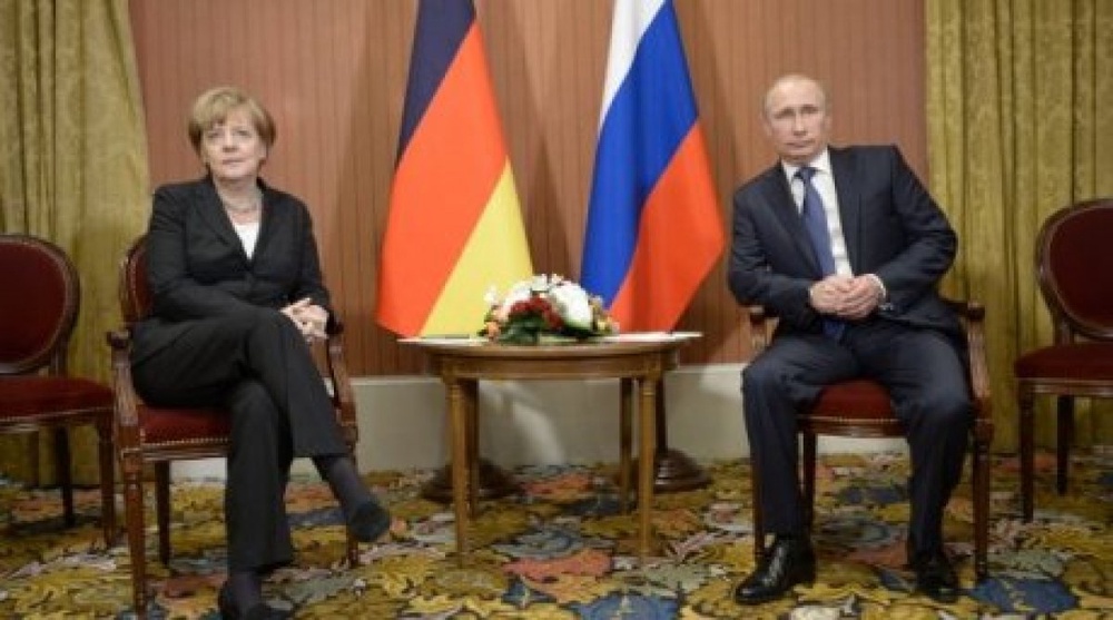 Ангела Меркель мен Владимир Путин. Сурет РИА Новости ақпарат құралынан алынған